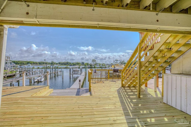 dock area with a water view