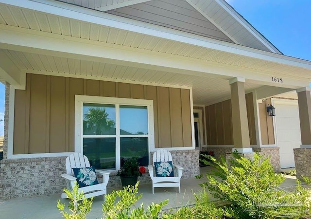 doorway to property featuring a porch