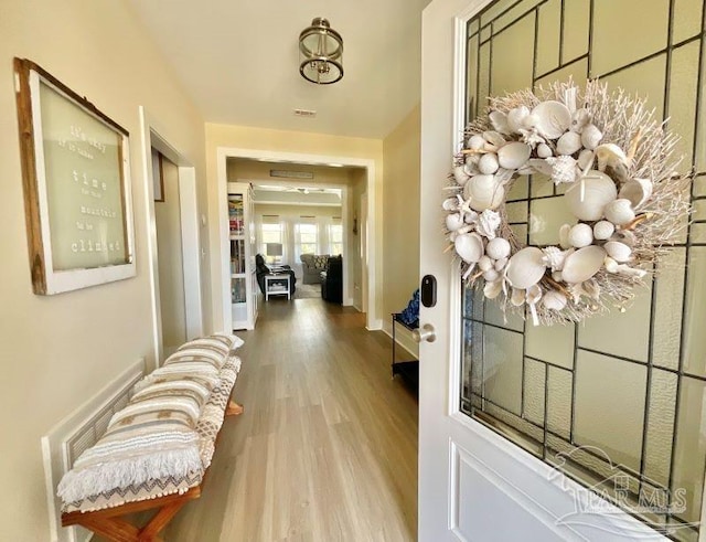 hallway featuring hardwood / wood-style flooring