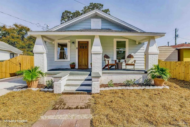 bungalow featuring a porch