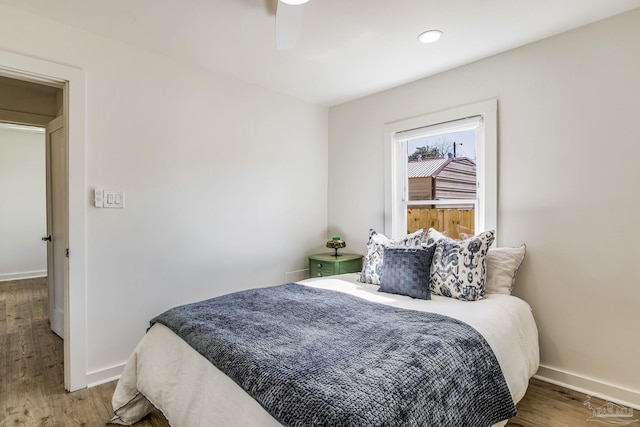 bedroom featuring hardwood / wood-style floors