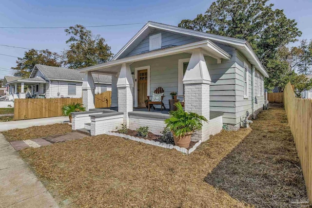 bungalow-style home featuring a porch