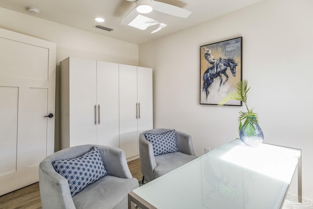 office featuring ceiling fan and light wood-type flooring