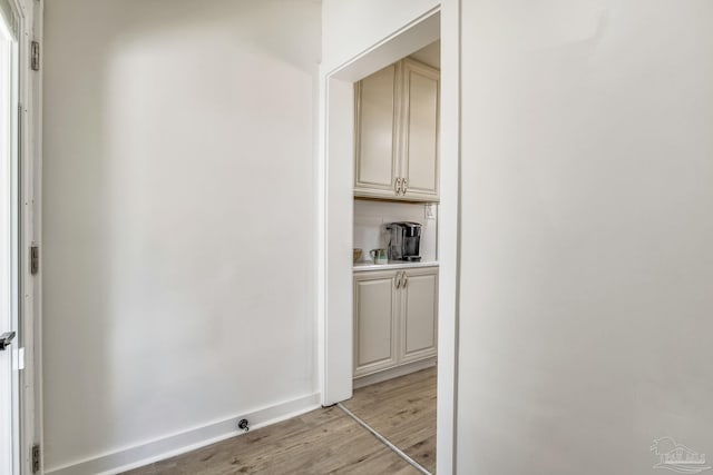 hallway with light wood-type flooring