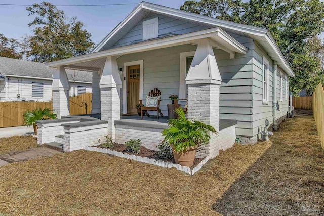 bungalow-style house featuring covered porch