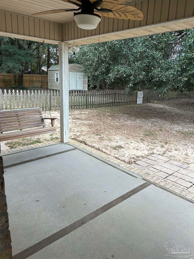 view of patio featuring ceiling fan