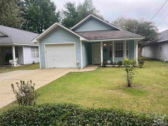 ranch-style home with a garage, covered porch, and a front yard