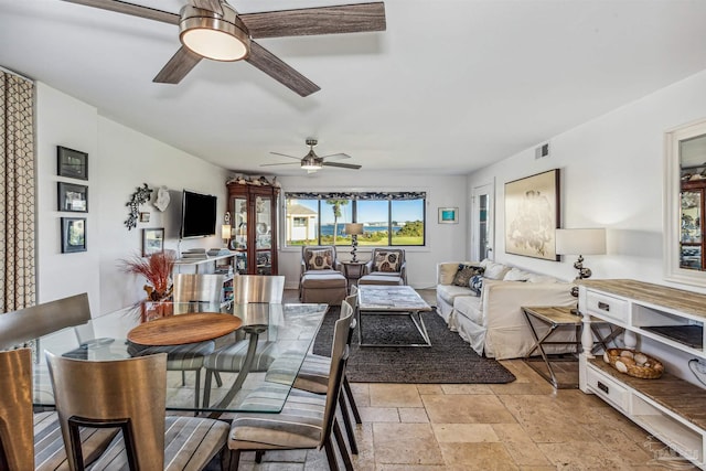 living room featuring ceiling fan