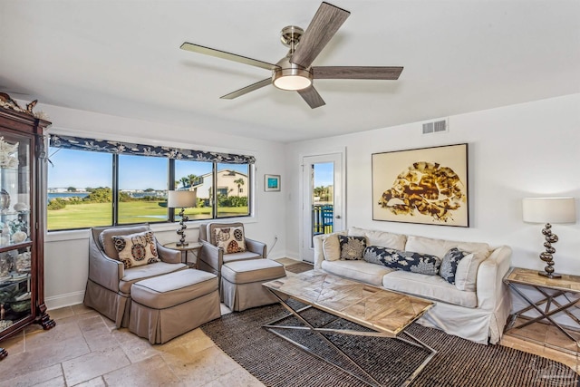 living room with ceiling fan