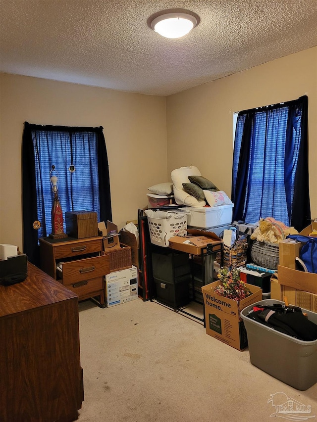 6017 Montgomery Ave, Pensacola, FL 32526 - bedroom with carpet flooring and a textured ceiling