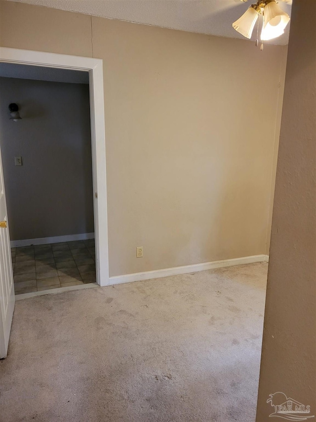 6017 Montgomery Ave, Pensacola, FL 32526 - unfurnished room featuring ceiling fan, carpet flooring, and baseboards
