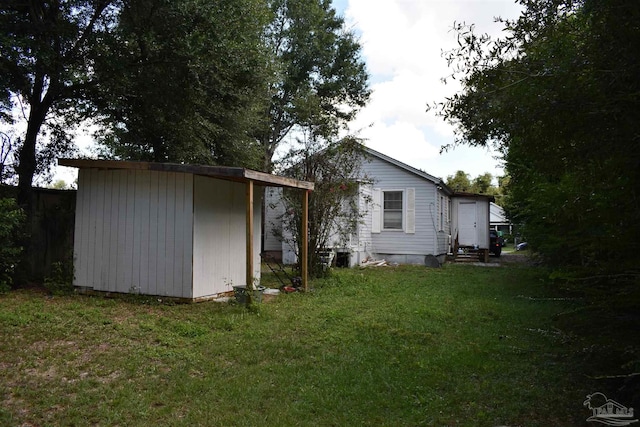 exterior space featuring a storage unit