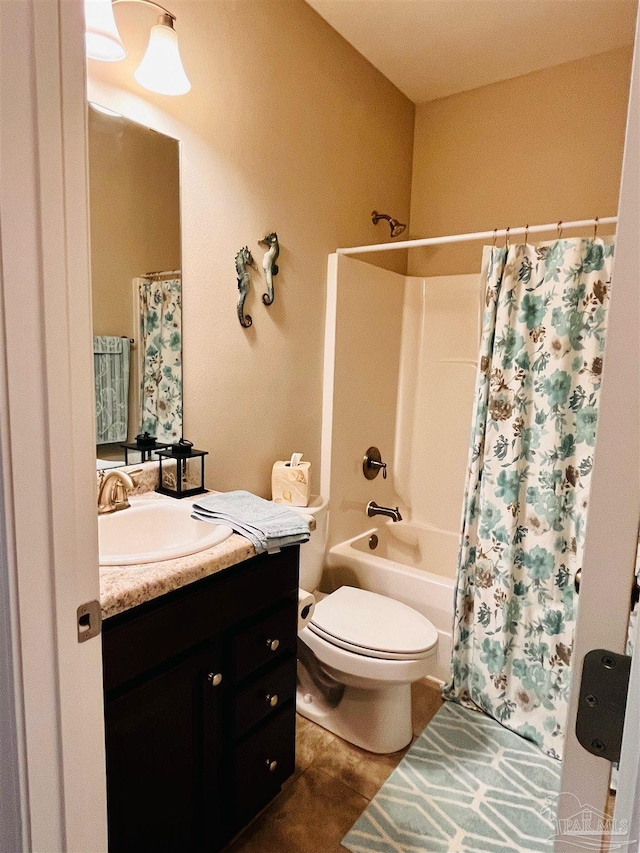 full bathroom with shower / tub combo with curtain, vanity, toilet, and tile patterned floors