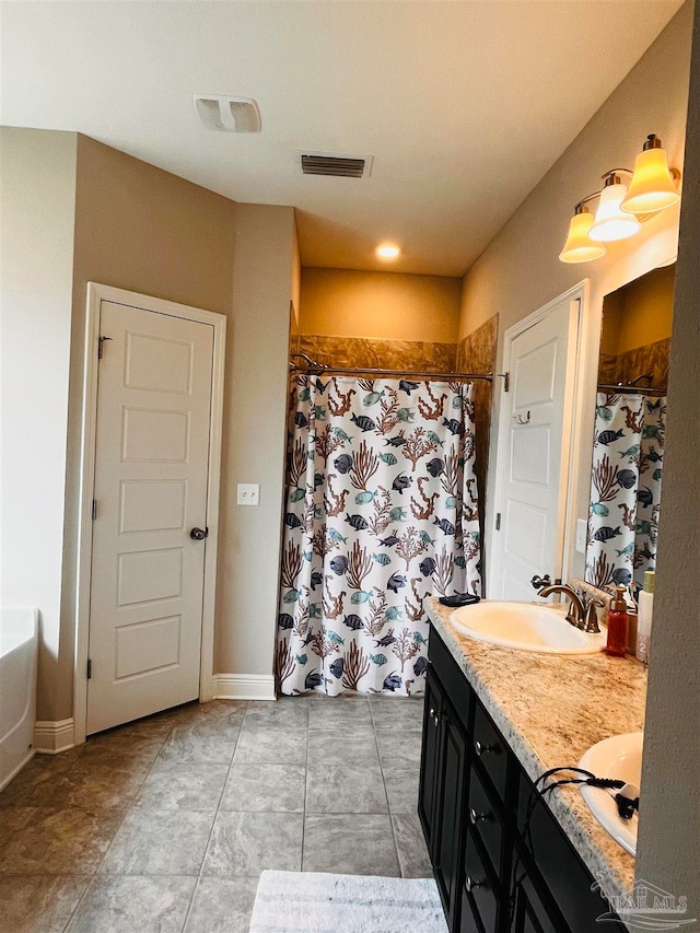 bathroom featuring vanity and plus walk in shower