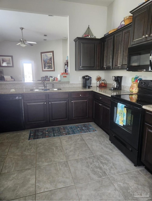 kitchen with sink, vaulted ceiling, black appliances, dark brown cabinetry, and ceiling fan