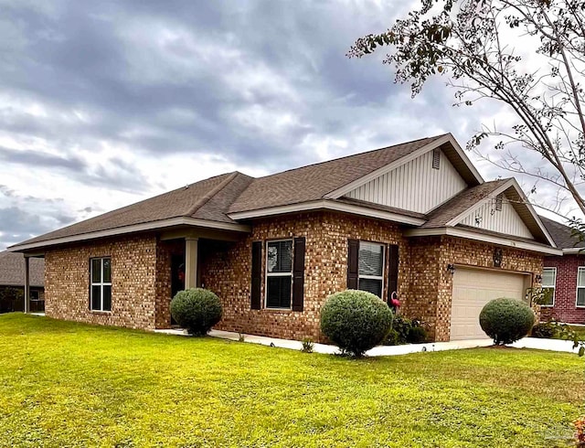 single story home featuring a front yard and a garage