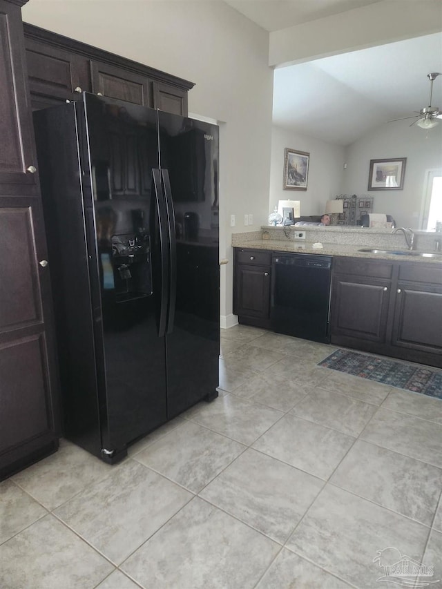 kitchen with dark brown cabinets, sink, vaulted ceiling, black appliances, and ceiling fan