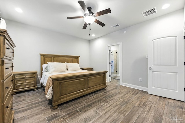 1567 Sawyers Ridge Cv, Cantonment, FL 32533 - bedroom featuring dark wood-style flooring, a ceiling fan, connected bathroom, and recessed lighting