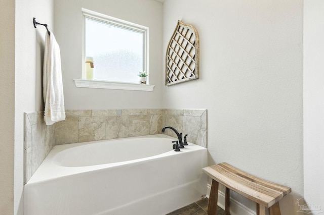 1567 Sawyers Ridge Cv, Cantonment, FL 32533 - bathroom featuring a garden tub