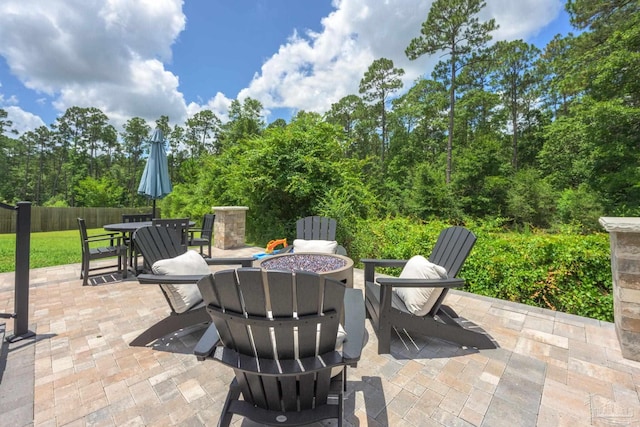 1567 Sawyers Ridge Cv, Cantonment, FL 32533 - view of patio with a fire pit and outdoor dining area