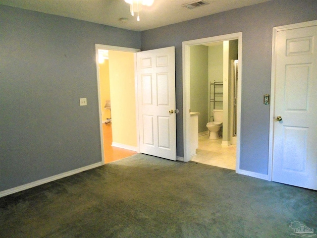 7067 Pine Blossom Rd, Milton, FL 32570 - unfurnished bedroom with dark colored carpet and connected bathroom