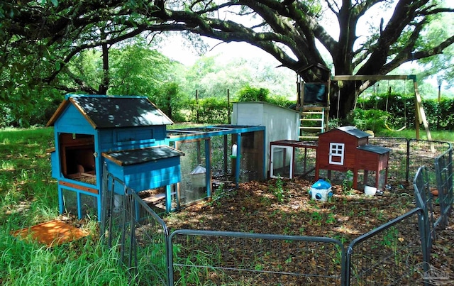 7067 Pine Blossom Rd, Milton, FL 32570 - view of yard with exterior structure and an outbuilding