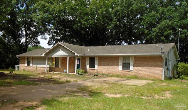 7067 Pine Blossom Rd, Milton, FL 32570 - single story home featuring brick siding and a porch