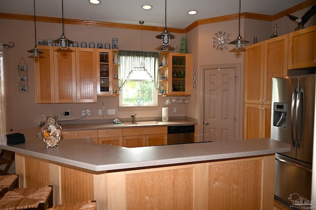 kitchen featuring decorative light fixtures, ornamental molding, sink, a breakfast bar area, and appliances with stainless steel finishes