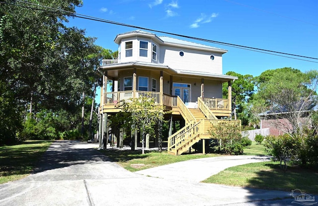 coastal inspired home with covered porch