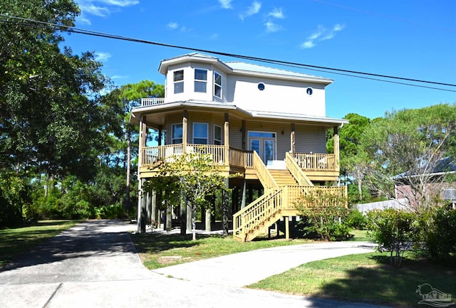 raised beach house with covered porch