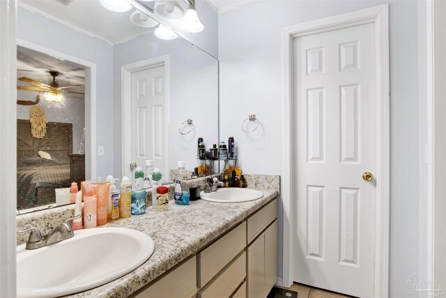 bedroom featuring ceiling fan, a textured ceiling, and light tile patterned floors