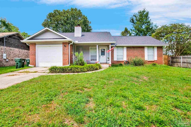 single story home featuring a front yard and a garage