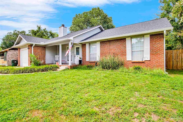 ranch-style house featuring a front lawn