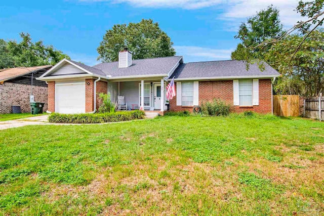 ranch-style home with a front yard, a garage, and covered porch