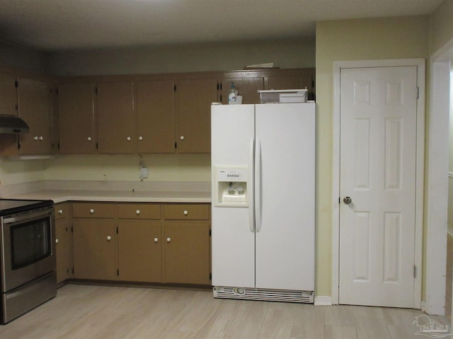 5078 Babb Ln, Pace, FL 32571 - kitchen featuring white fridge with ice dispenser, stainless steel range with electric stovetop, under cabinet range hood, and light countertops