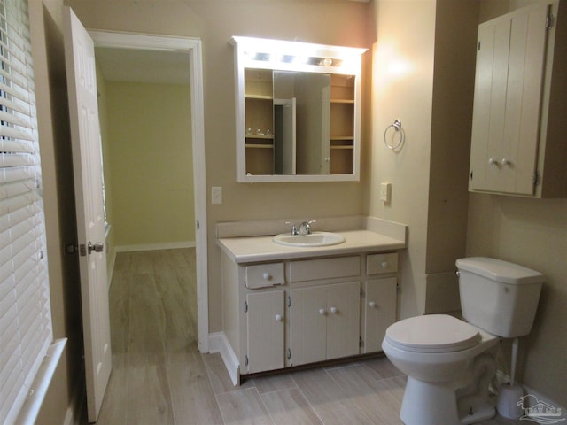 5078 Babb Ln, Pace, FL 32571 - bathroom with vanity and wood finished floors