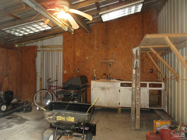 5078 Babb Ln, Pace, FL 32571 - garage featuring ceiling fan and a sink