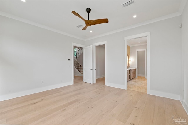 unfurnished bedroom featuring crown molding, ceiling fan, and connected bathroom