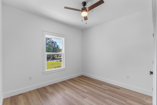 empty room featuring light hardwood / wood-style floors and ceiling fan