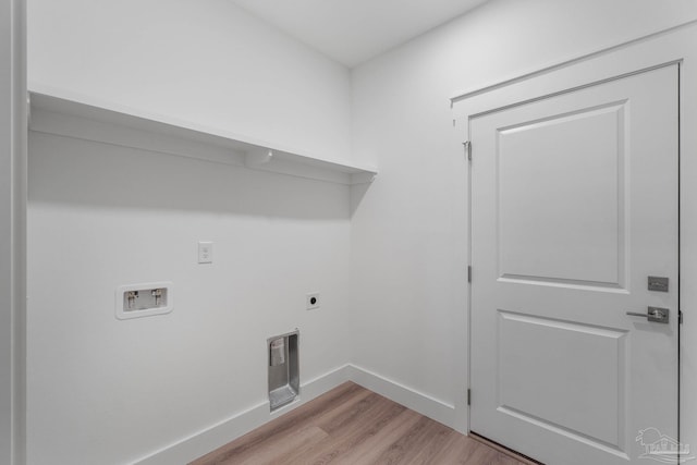 laundry area with electric dryer hookup, washer hookup, and light wood-type flooring