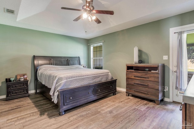 bedroom featuring hardwood / wood-style floors and ceiling fan