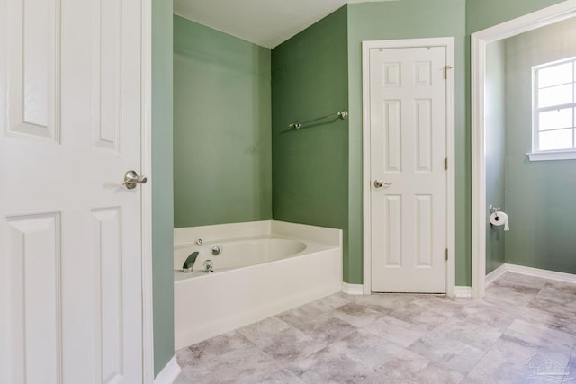 bathroom with a washtub