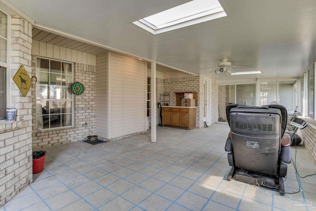 view of patio featuring ceiling fan