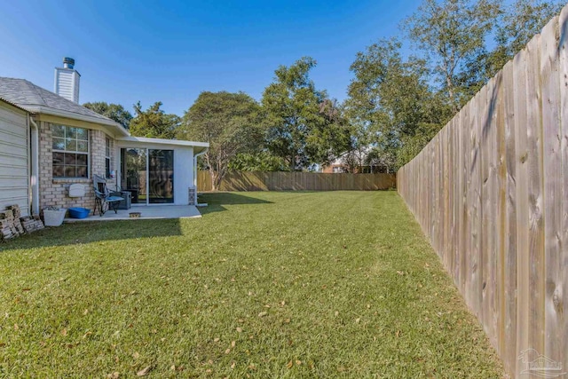 view of yard with a patio area