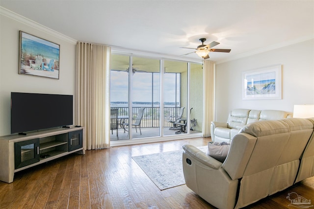 living room featuring a wall of windows, crown molding, hardwood / wood-style floors, and ceiling fan