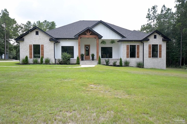 modern inspired farmhouse with a front yard