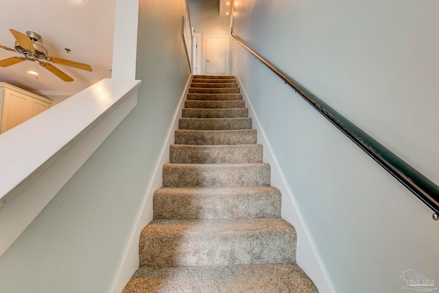 staircase with ceiling fan