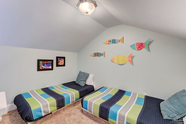 carpeted bedroom featuring lofted ceiling