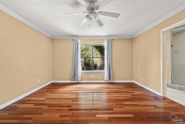 unfurnished room featuring crown molding, ceiling fan, hardwood / wood-style flooring, and a textured ceiling