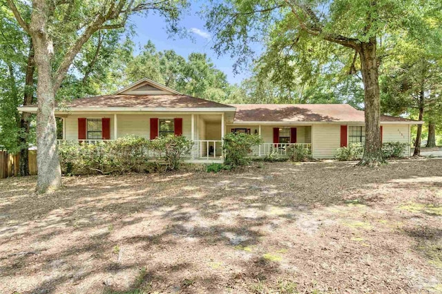 ranch-style house with covered porch